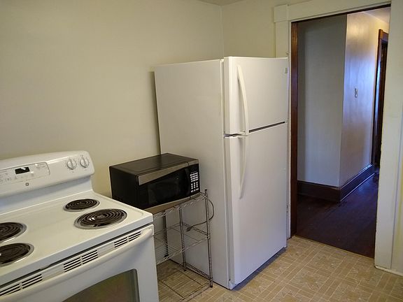 Kitchen stove, microwave, refrigerator