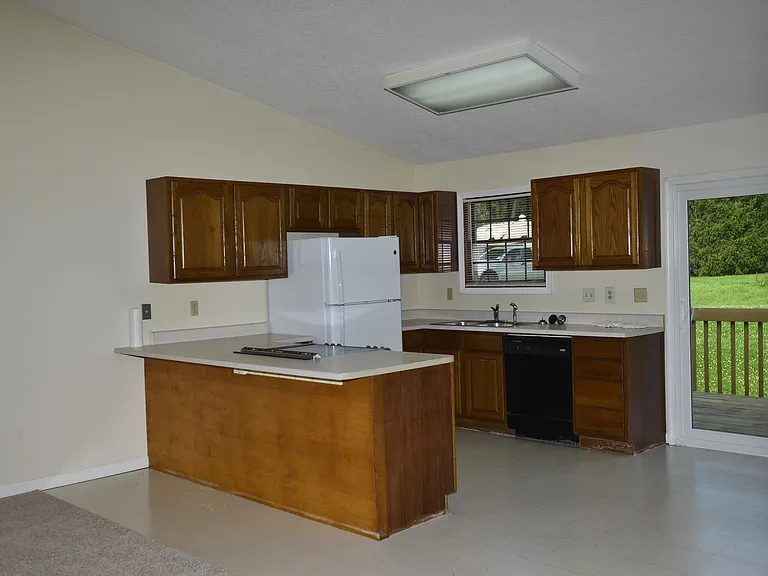 Kitchen with Deck Entrance. New Deck Entrance Sliding Door.