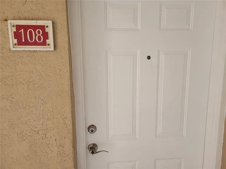 5005 Wiles Rd #108 — Photo 9