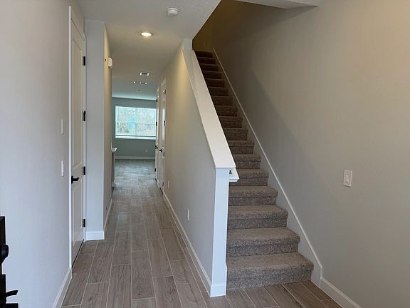 Front entrance opens up into spacious foyer