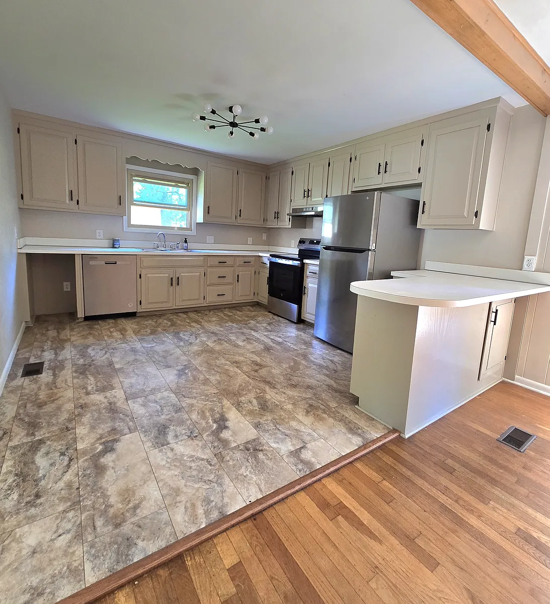Kitchen with new stainless steel appliances - 109 Griffin St