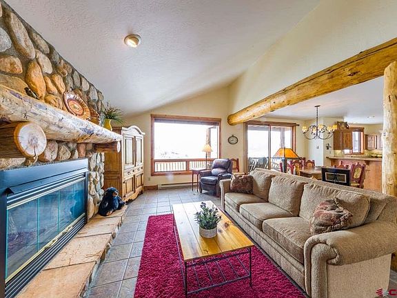 Gas Fireplace, open to the dining area, views of CBMR, deck off the dining area