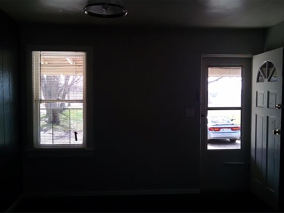 Additional view looking toward entry from kitchen area