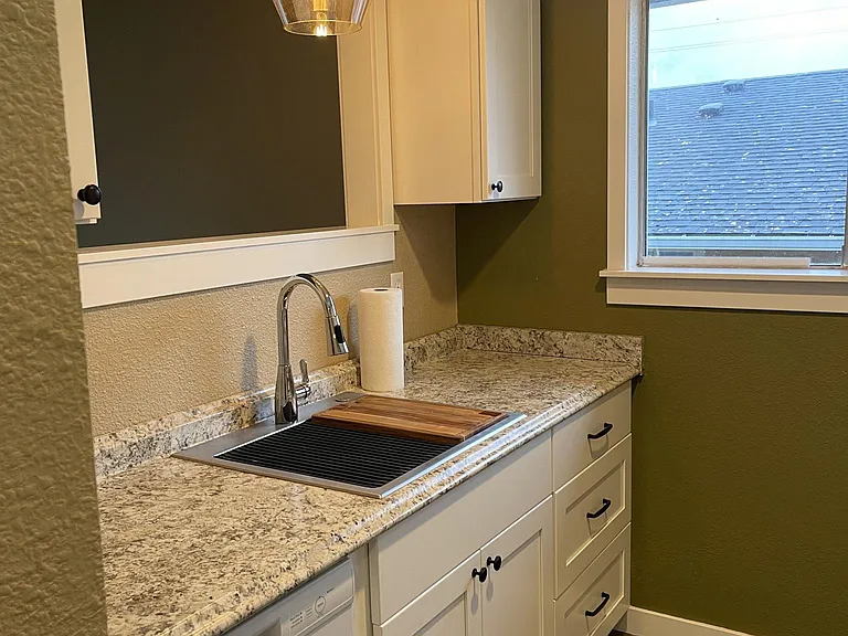 All new kitchen cabinets and sink