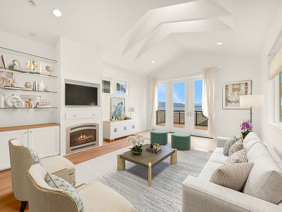 Living Room with French doors and view of Bay.