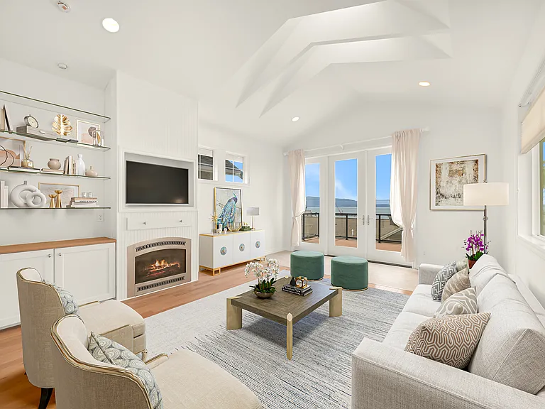 Living Room with French doors and view of Bay.