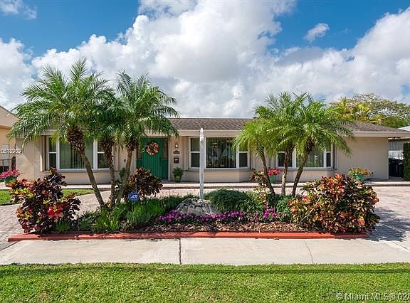 Front of house with beautiful landscaping