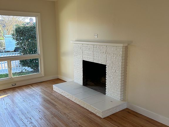 Beautiful fireplace serving as the centerpiece of the living room.
More elevated: