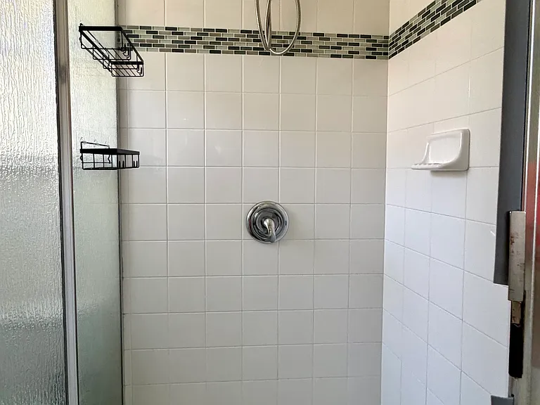 Shower with glass closure.