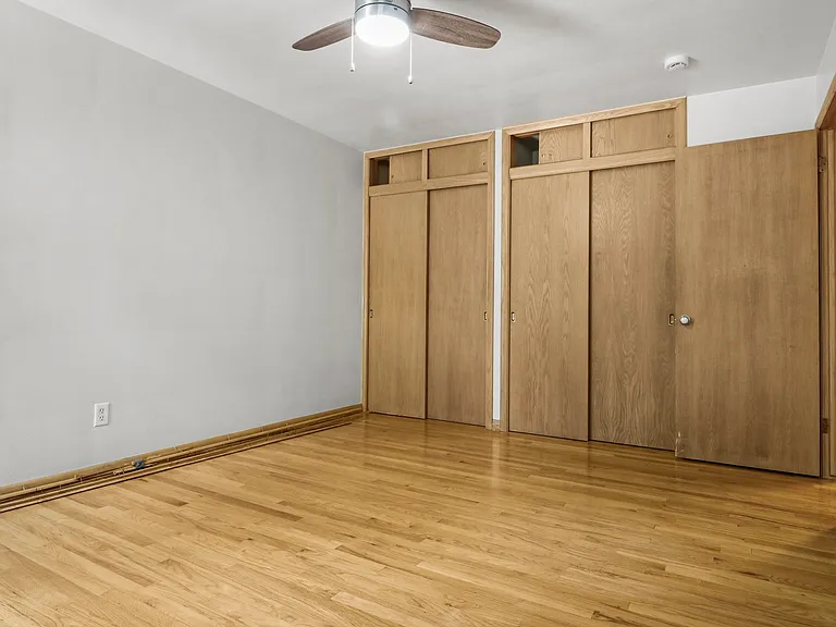 Same bedroom, CHECK out that storage!