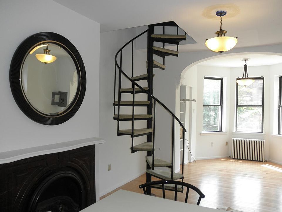 Spiral staircase to bedroom