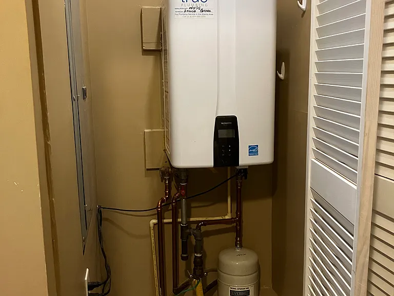 Laundry storage closet and water heater