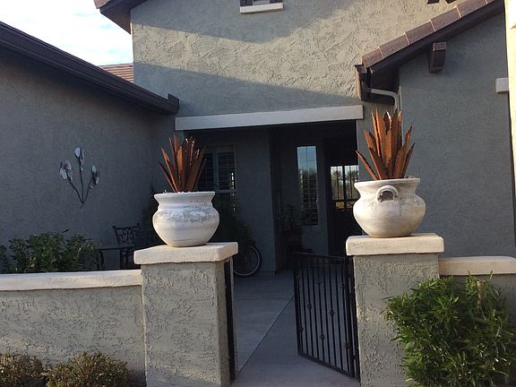 GATED ENTRY W/PRIVATE PATIO.