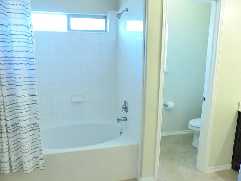 The Primary bath has a nice size garden tub shower