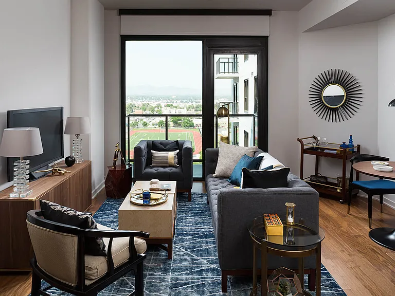 Floor to ceiling windows with breathtaking mountain/city views