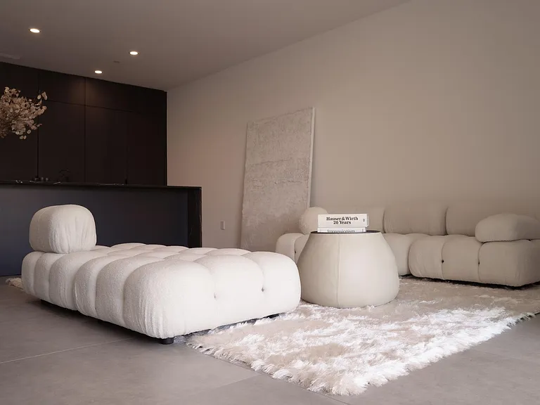 Open concept Living Room with Direct Access to Contemporary Kitchen _ Thoughtfully curated interiors with clean lines provide a perfect balance of luxury and comfort at Asteras Kings.