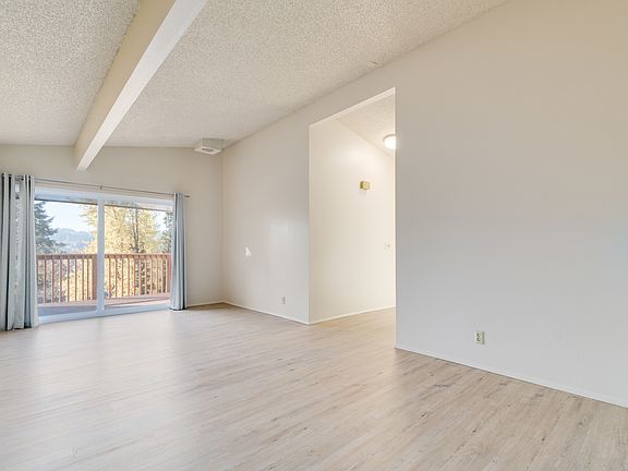 Living room with slider to the deck