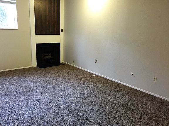 Living room with new carpet & paint