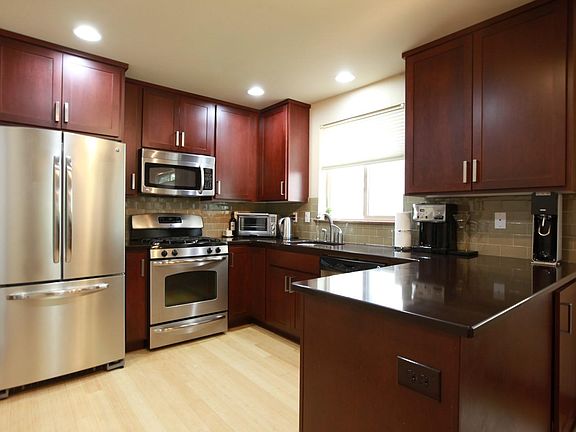 Beautiful kitchen with stainless appliances