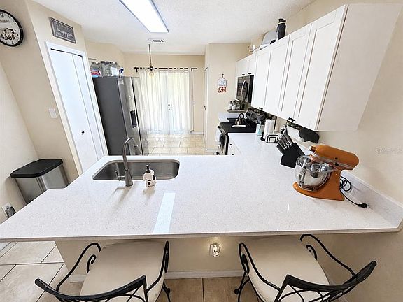 3rd image of 12718 WOOD TRAIL BOULEVARD
