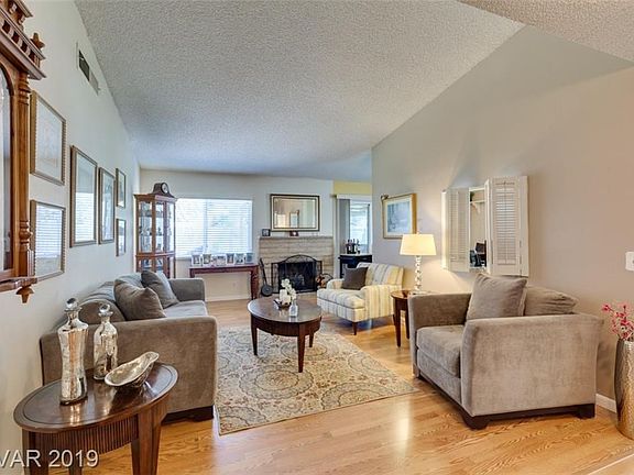 Living Room with Wood Burning Fireplace