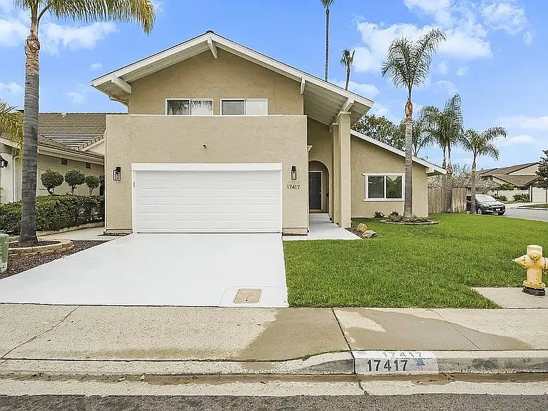 Street view with new insultated garage door.