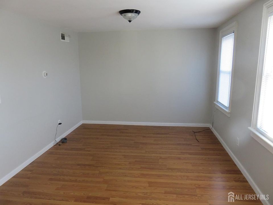Living room with access to attic space, the right of the picture
