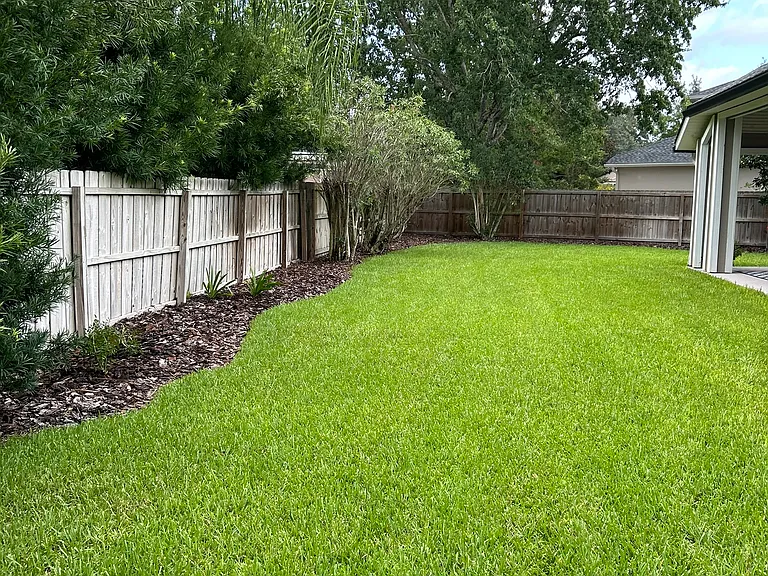 Private fenced in backyard