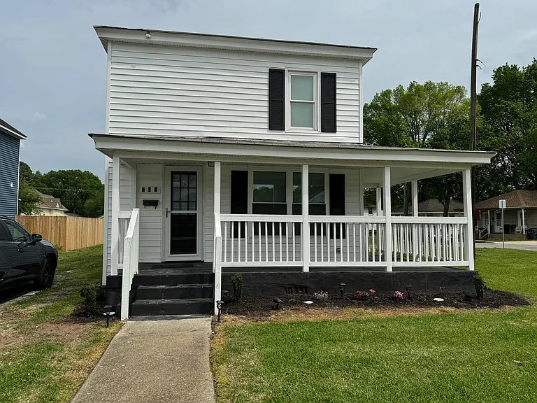 Front of house with amazing wrap-around porch