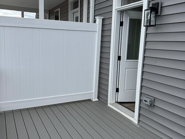 8'x14' Composite Deck off of Kitchen with Privacy Fence