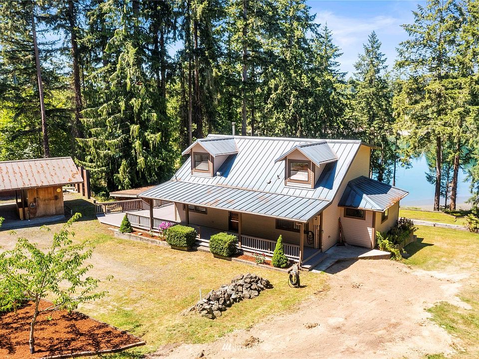 Spectacular Lake Bay waterfront featuring 2.5 acres of gentle sloping property to owned tidelands>