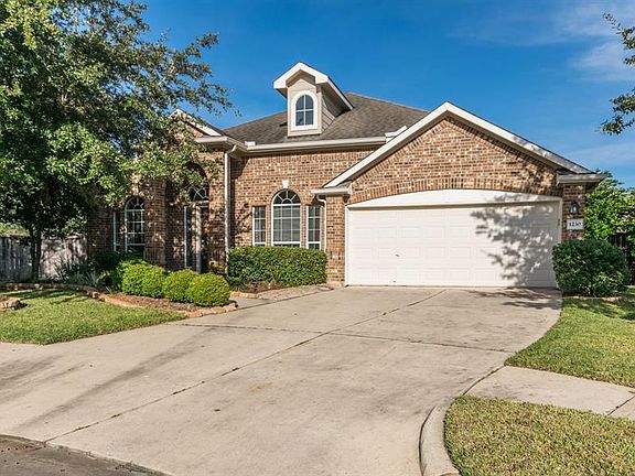 Property also features dual wide driveway for extra parking.