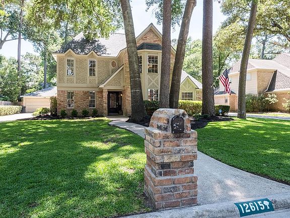 The perfectly manicured lawn is just a hint of how well maintained this home truly is! The sun's rays highlight every angle of t