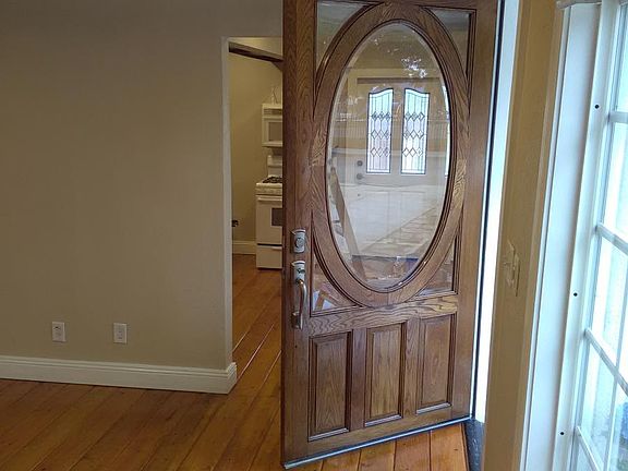 Front Door open as seen inside the house.