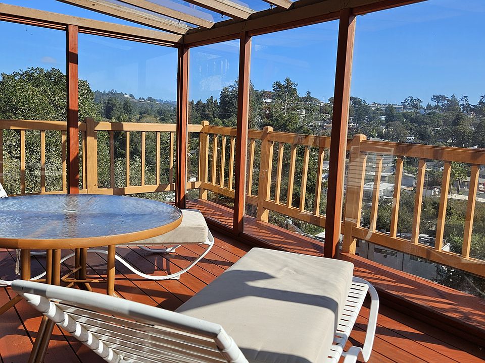 Enclosed patio with views adjacent to living room.