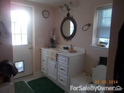 Full bath #2
						:
						Door to yard; laundry room off bathroom with shower