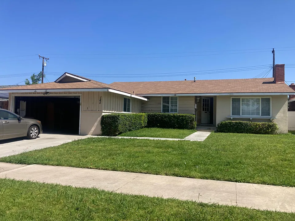 145 E Quincy Ave