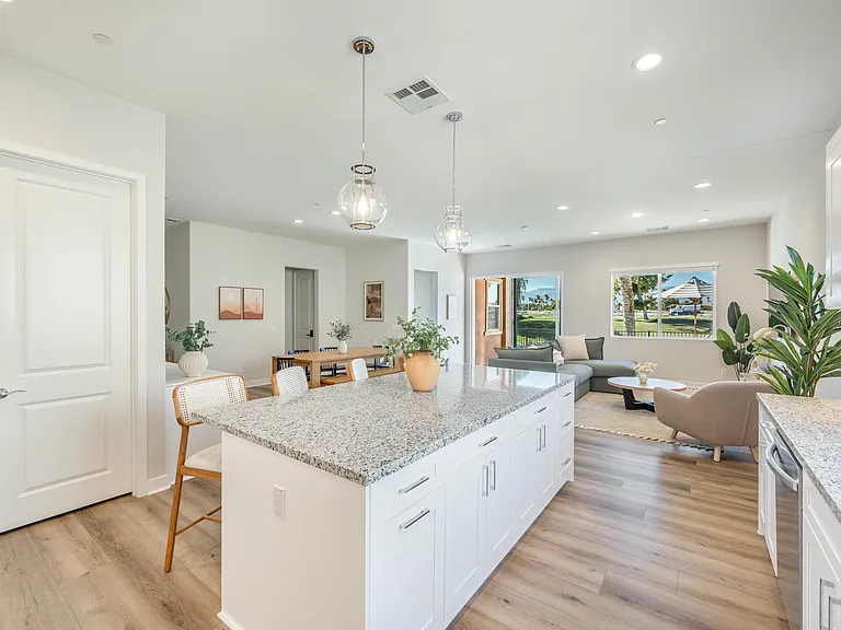 The large granite island is perfect for all of your homemade creations.