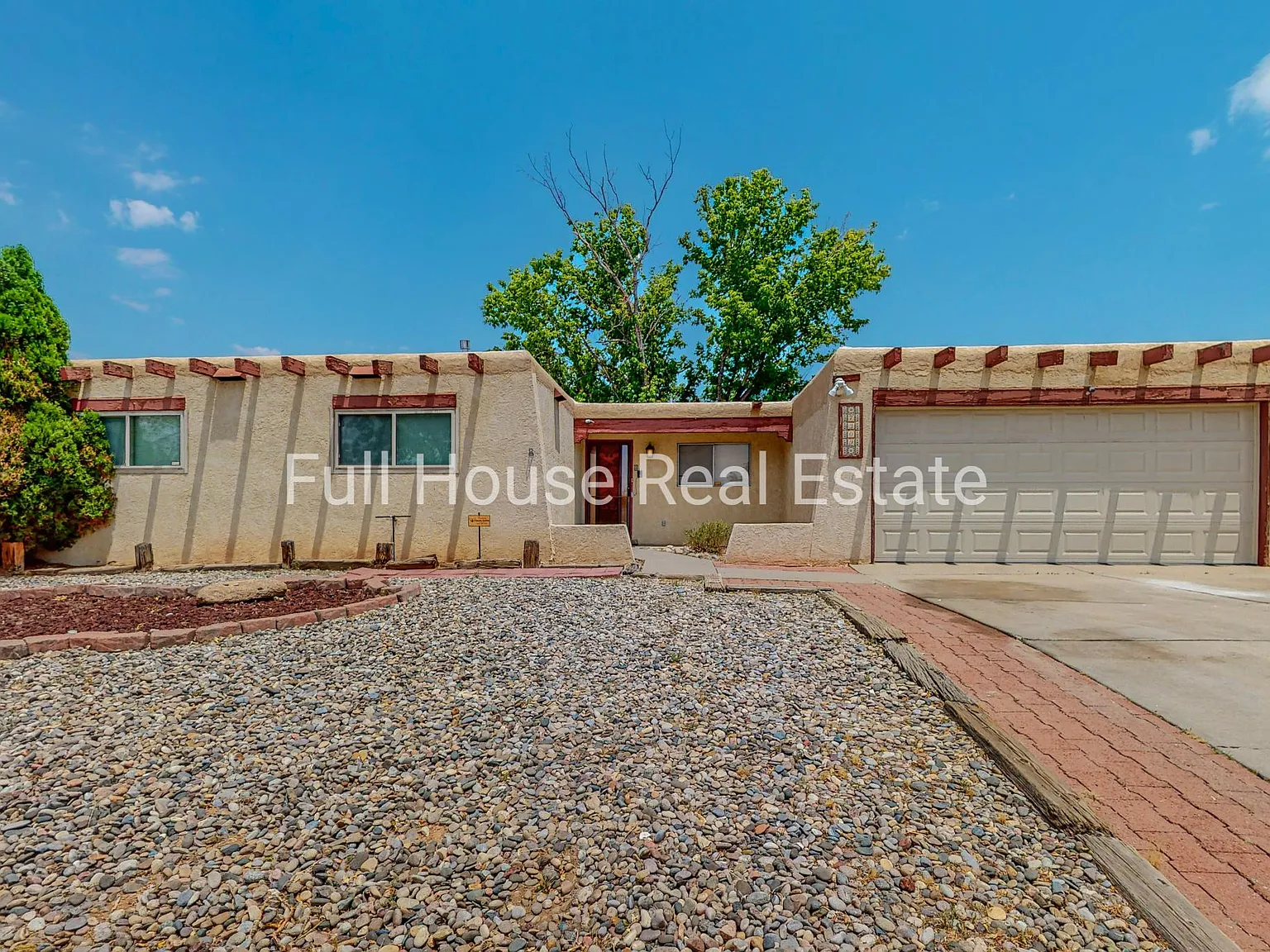 7309 Coulson Dr NE — Photo 1