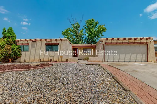 7309 Coulson Dr NE Photo 1