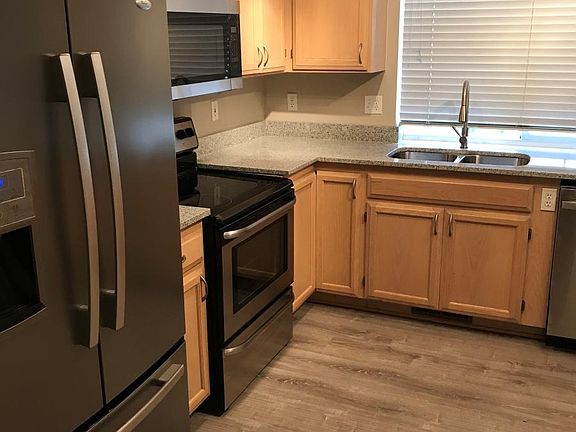 Open kitchen with plenty of cabinets