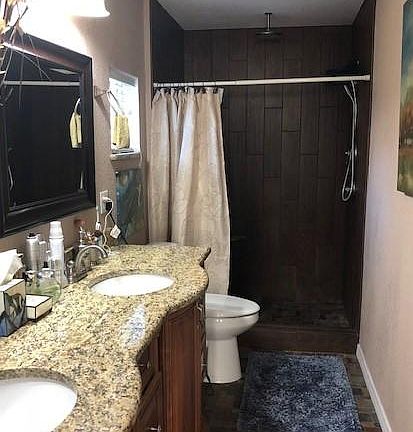 Master bath. Remodeled with dual sinks. Also has extra rain