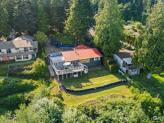Beautiful home, sited on a deep lot and offering sunny, grassy spaces for play and entertaining!>