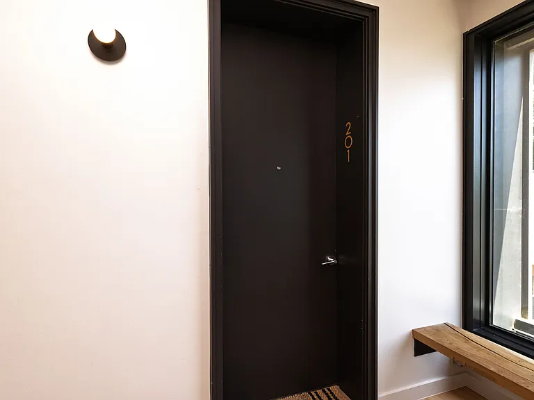 View of the front door to the apartment.