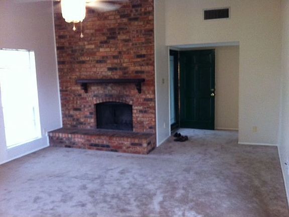 Family room, freshly painted with new carpeting