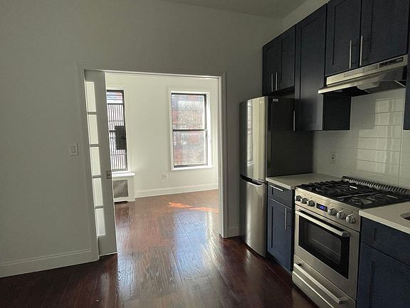 2nd image of 217 E 4th St APT 1E