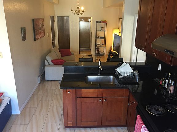 Kitchen looking into living room