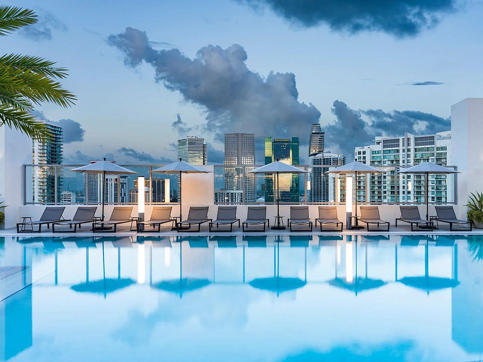 Take in breathtaking Miami skyline views from Modera Riverside's rooftop pool deck.