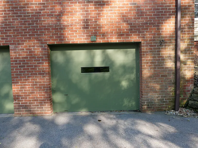 Two car garage. Cars must park vertically.