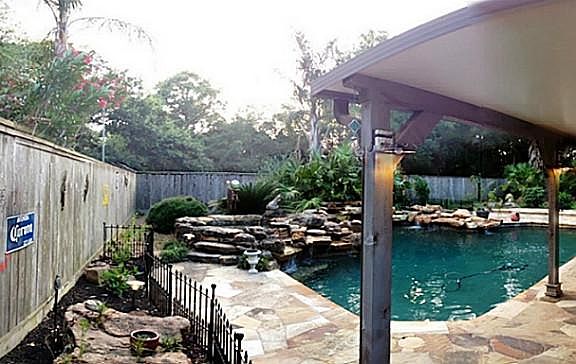  Another View of the back yard with Spa, Pool and Waterfalls.